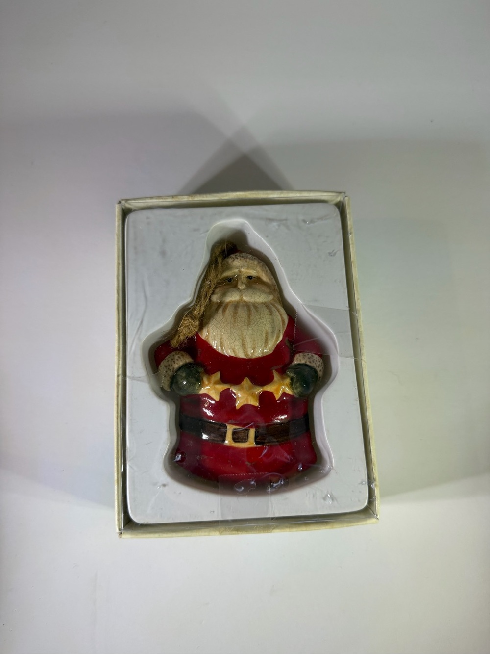 Russ Red and Cream Santa Ornament with Gold Star
